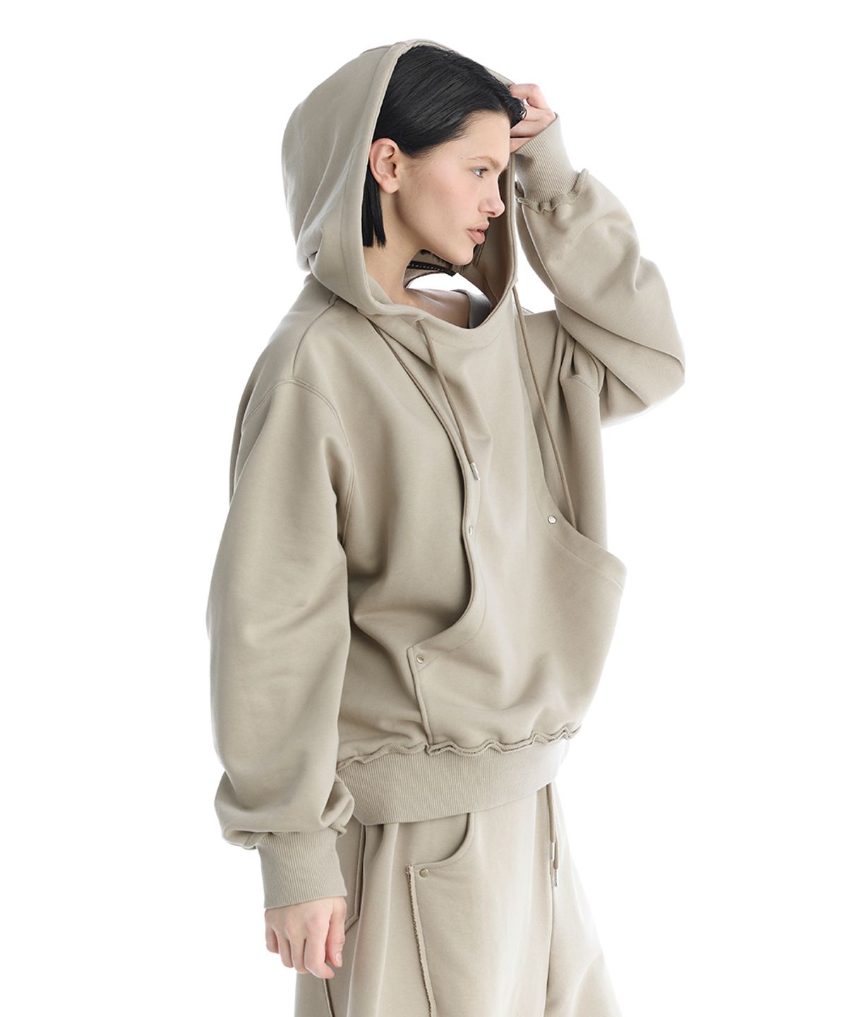 트리밍버드(TREEMINGBIRD) TMB One-Shoulder Raw Cut Set-Up Hoodie [ Beige ]