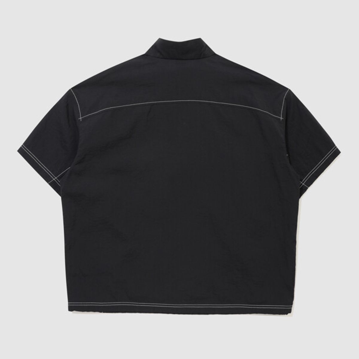 엄브로(UMBRO) 크리스피 타슬란 반팔 아노락 블랙 UR224CWT59