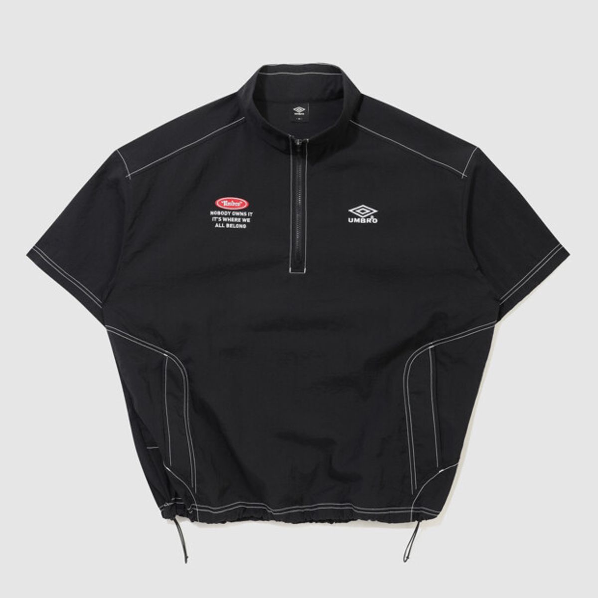 엄브로(UMBRO) 크리스피 타슬란 반팔 아노락 블랙 UR224CWT59