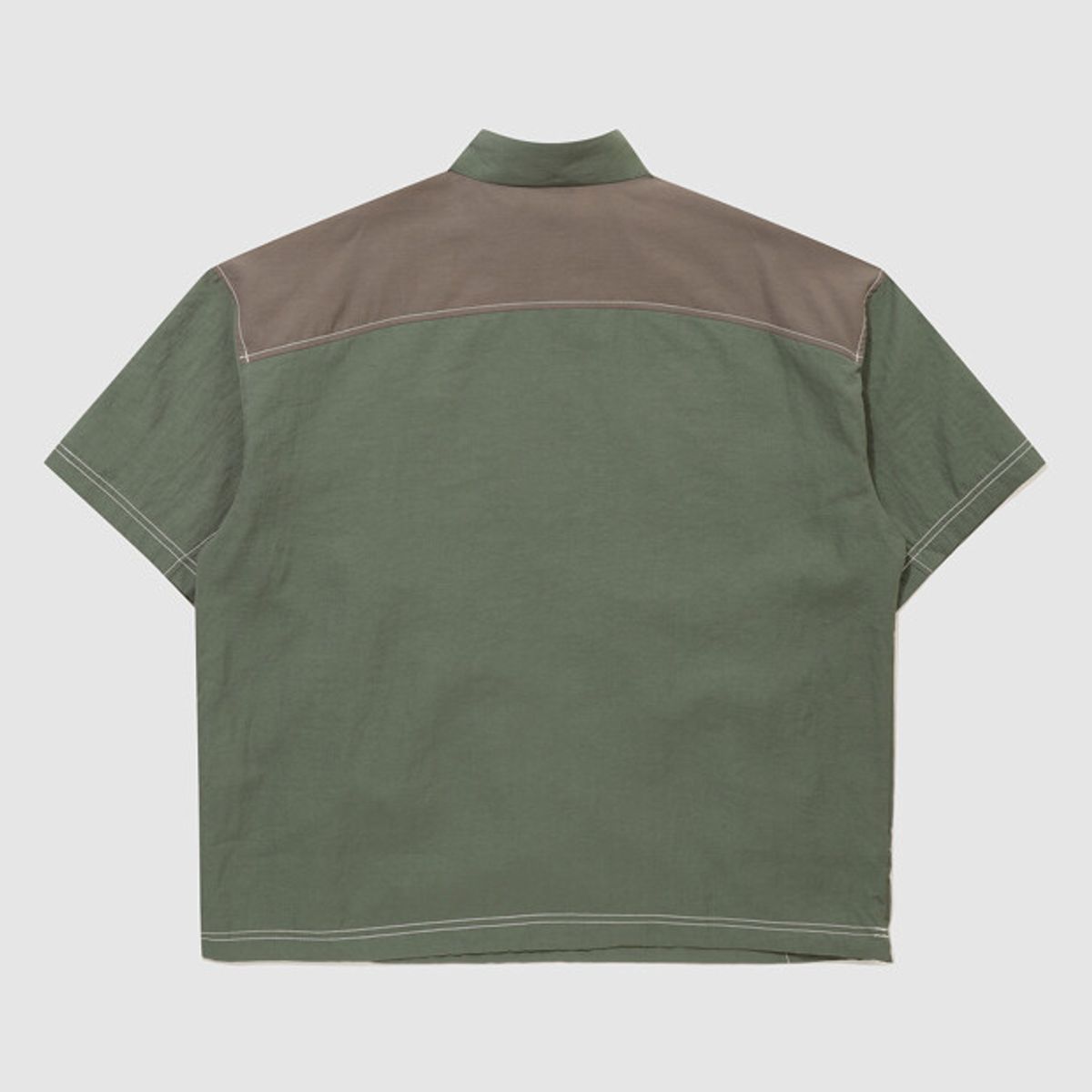 엄브로(UMBRO) 크리스피 타슬란 반팔 아노락 카키 UR224CWT59
