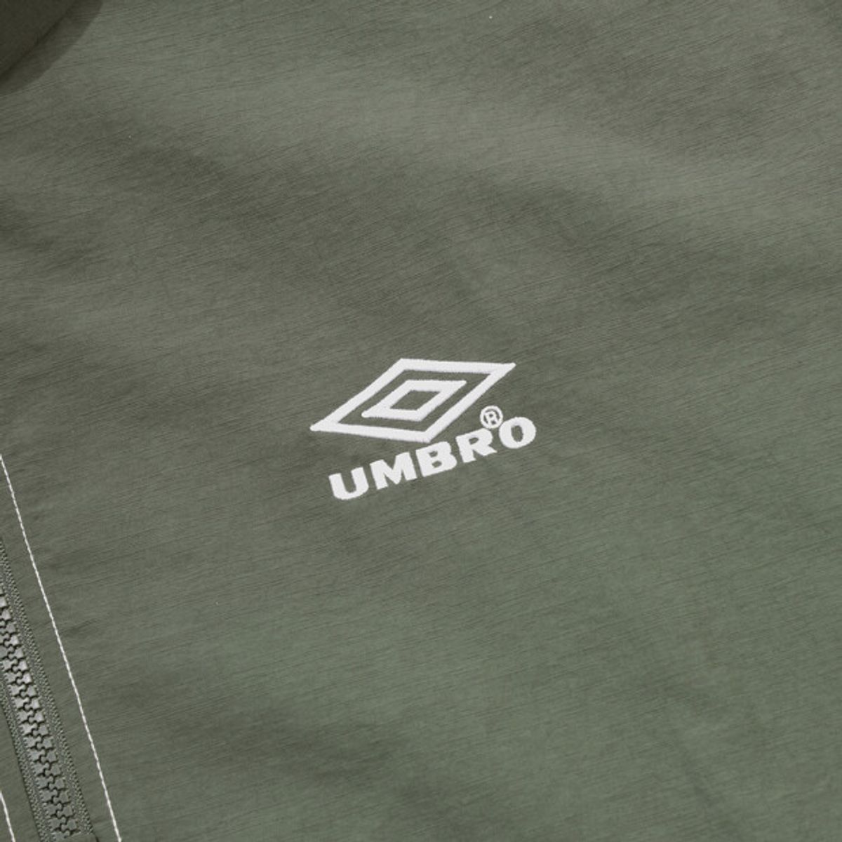 엄브로(UMBRO) 크리스피 타슬란 반팔 아노락 카키 UR224CWT59