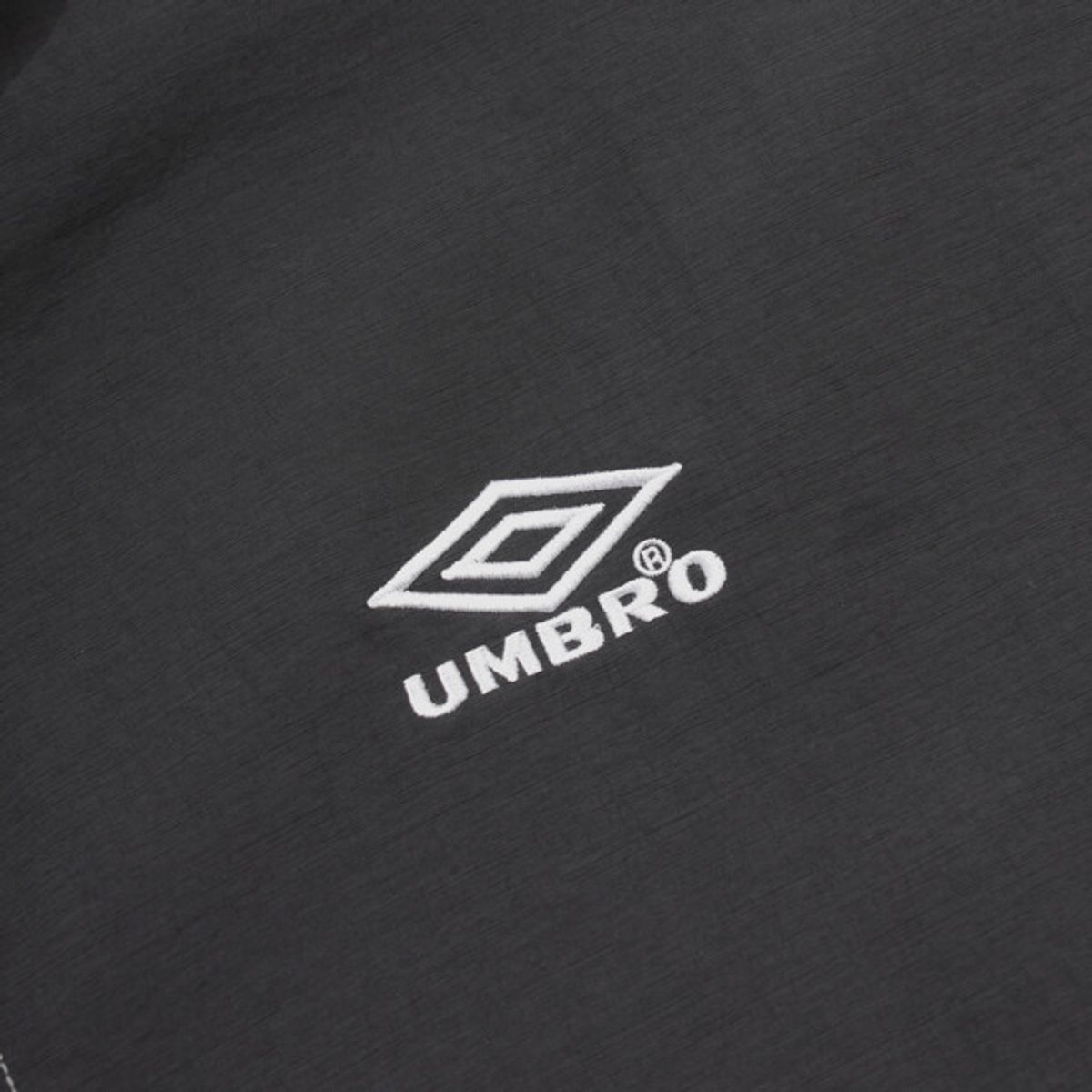 엄브로(UMBRO) 크리스피 타슬란 반팔 아노락 차콜 UR224CWT59