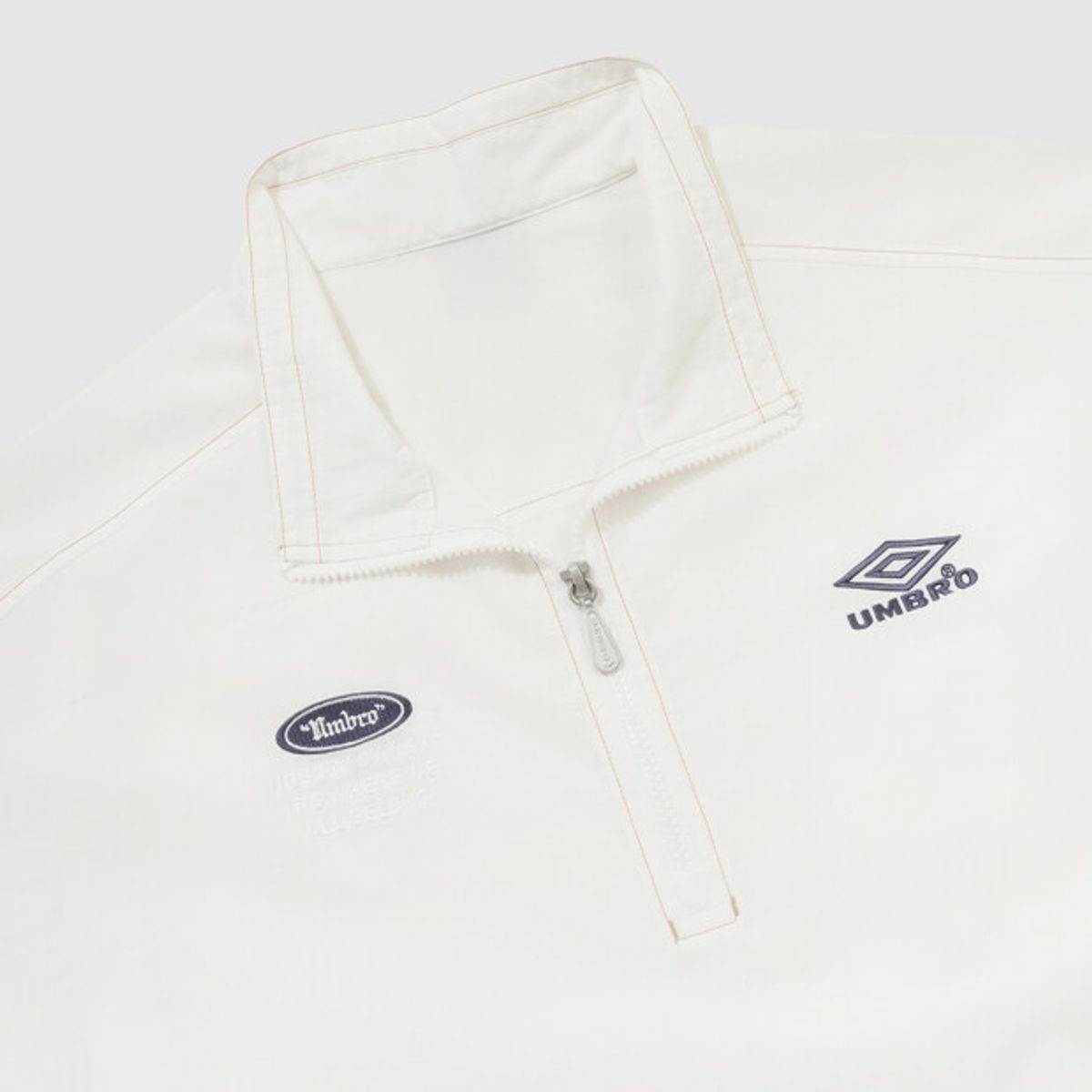 엄브로(UMBRO) 크리스피 타슬란 반팔 아노락 화이트 UR224CWT59