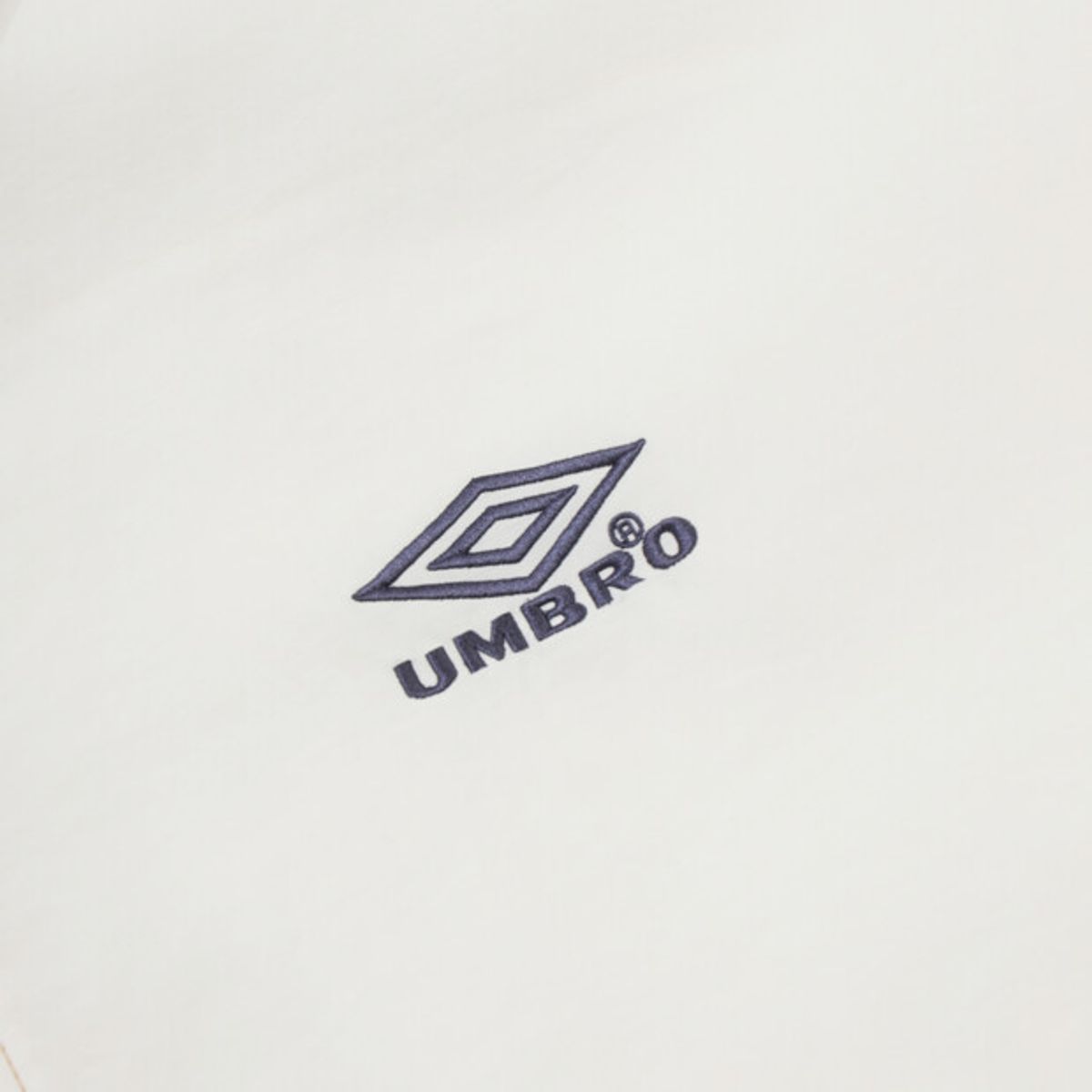 엄브로(UMBRO) 크리스피 타슬란 반팔 아노락 화이트 UR224CWT59