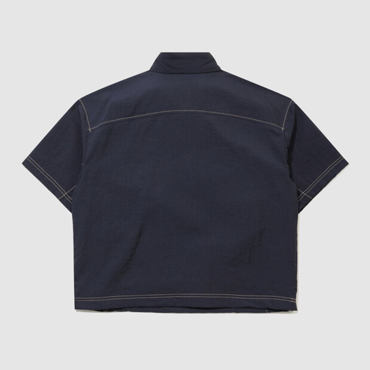 엄브로(UMBRO) 크리스피 타슬란 반팔 아노락 네이비 UR224CWT59