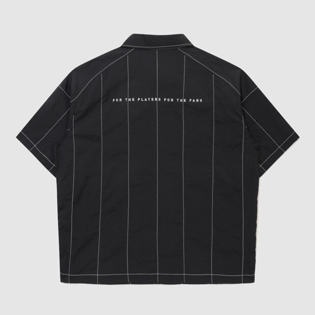엄브로(UMBRO) 크리스피 타슬란 반팔 셔츠 블랙 UR221CJK58