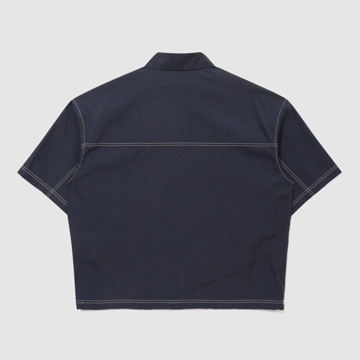 엄브로(UMBRO) 크리스피 타슬란 스탠넥 반팔 풀집 자켓 네이비 UR221CJK57