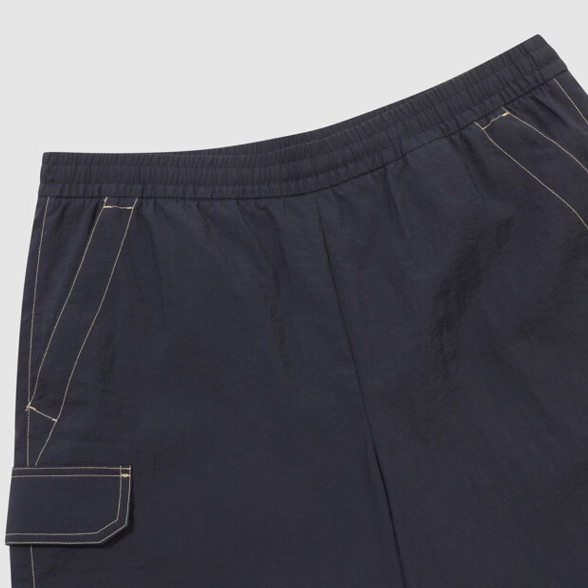 엄브로(UMBRO) 크리스피 타슬란 카고 4.5부 반바지 네이비 UR223CHP59