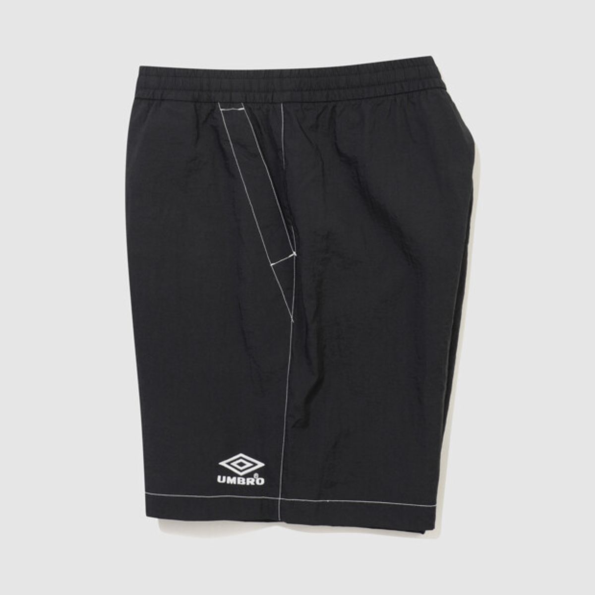 엄브로(UMBRO) 크리스피 타슬란 카고 4.5부 반바지 블랙 UR223CHP59
