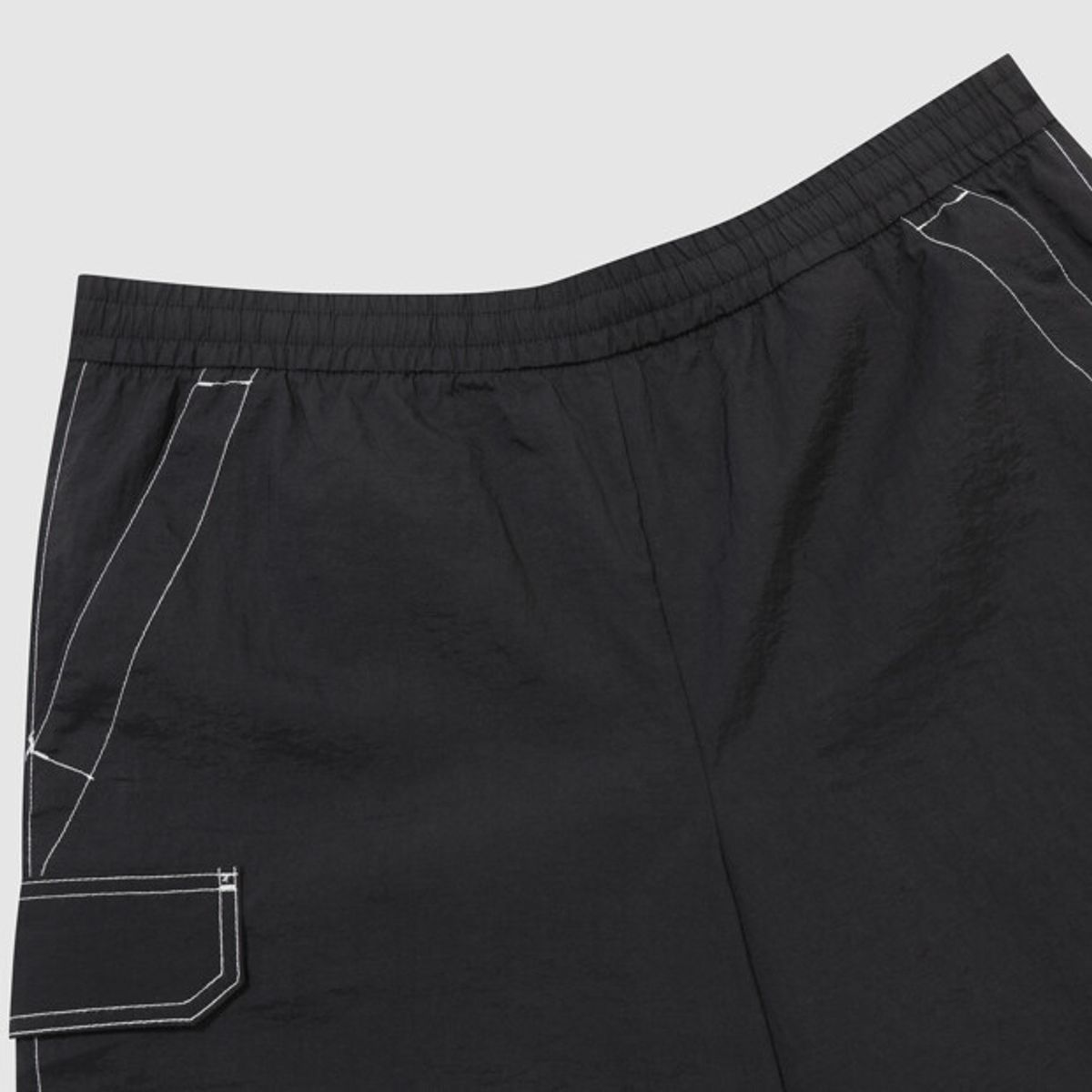 엄브로(UMBRO) 크리스피 타슬란 카고 4.5부 반바지 블랙 UR223CHP59