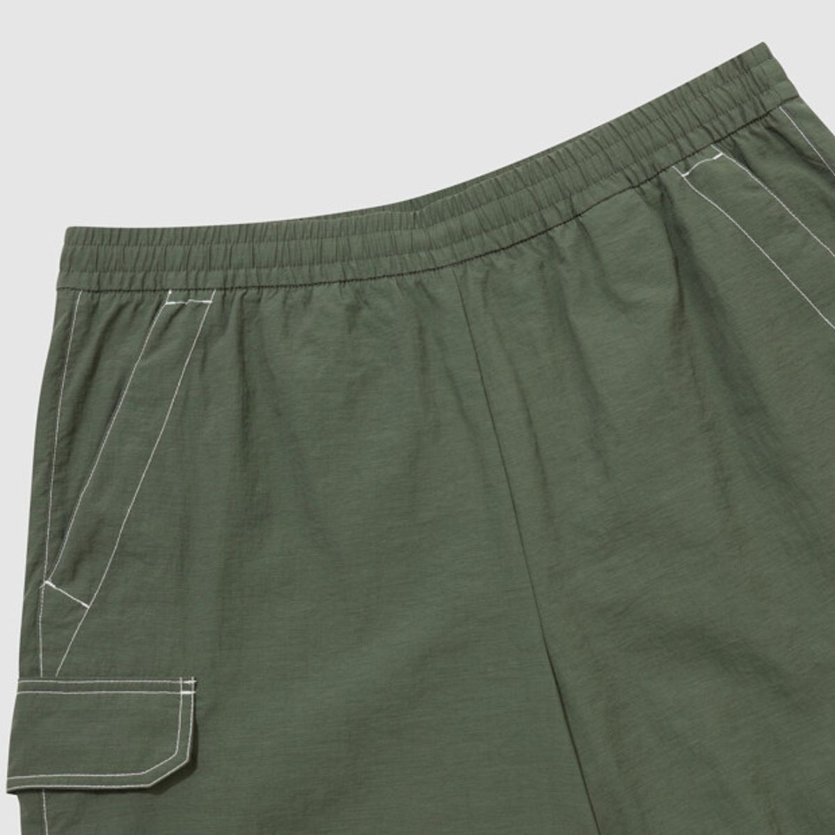엄브로(UMBRO) 크리스피 타슬란 카고 4.5부 반바지 카키 UR223CHP59