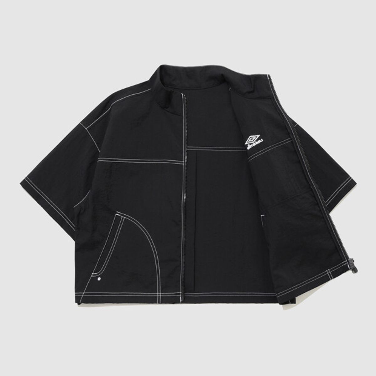 엄브로(UMBRO) 크리스피 타슬란 우먼스 반팔 풀집 자켓 블랙 UR222CJK57