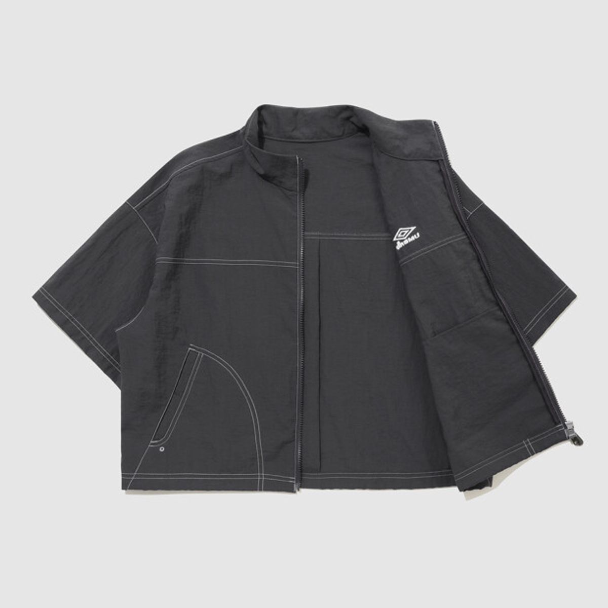 엄브로(UMBRO) 크리스피 타슬란 우먼스 반팔 풀집 자켓 차콜 UR222CJK57