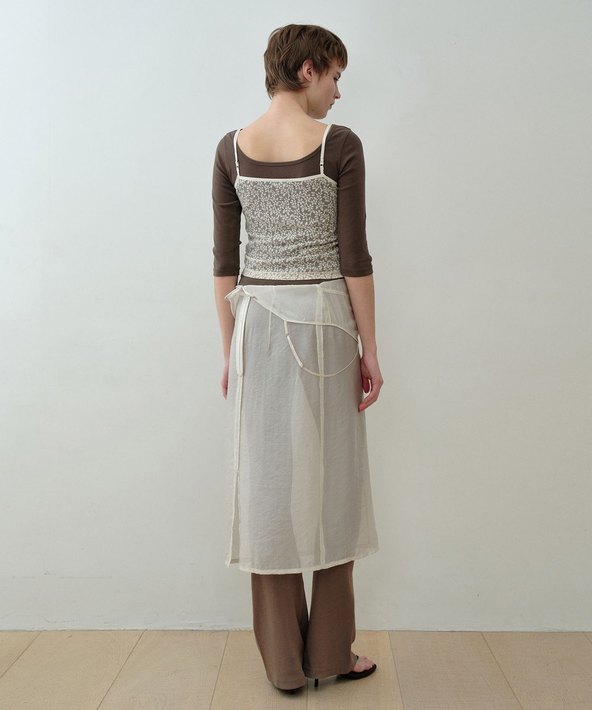 시메트릭 퍼센트(SYMMETRICPERCENT) Floral Sheer Sleeveless Top / Ivory