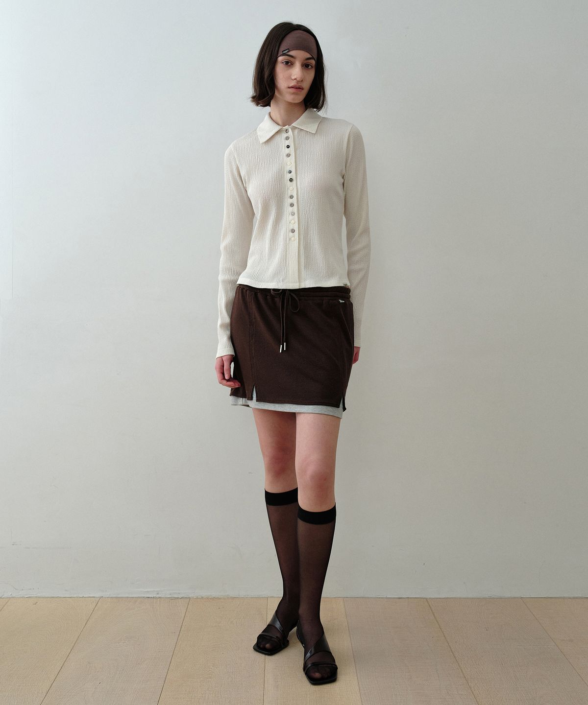 시메트릭 퍼센트(SYMMETRICPERCENT) Knitlike Layered Mini Skirt / Brown