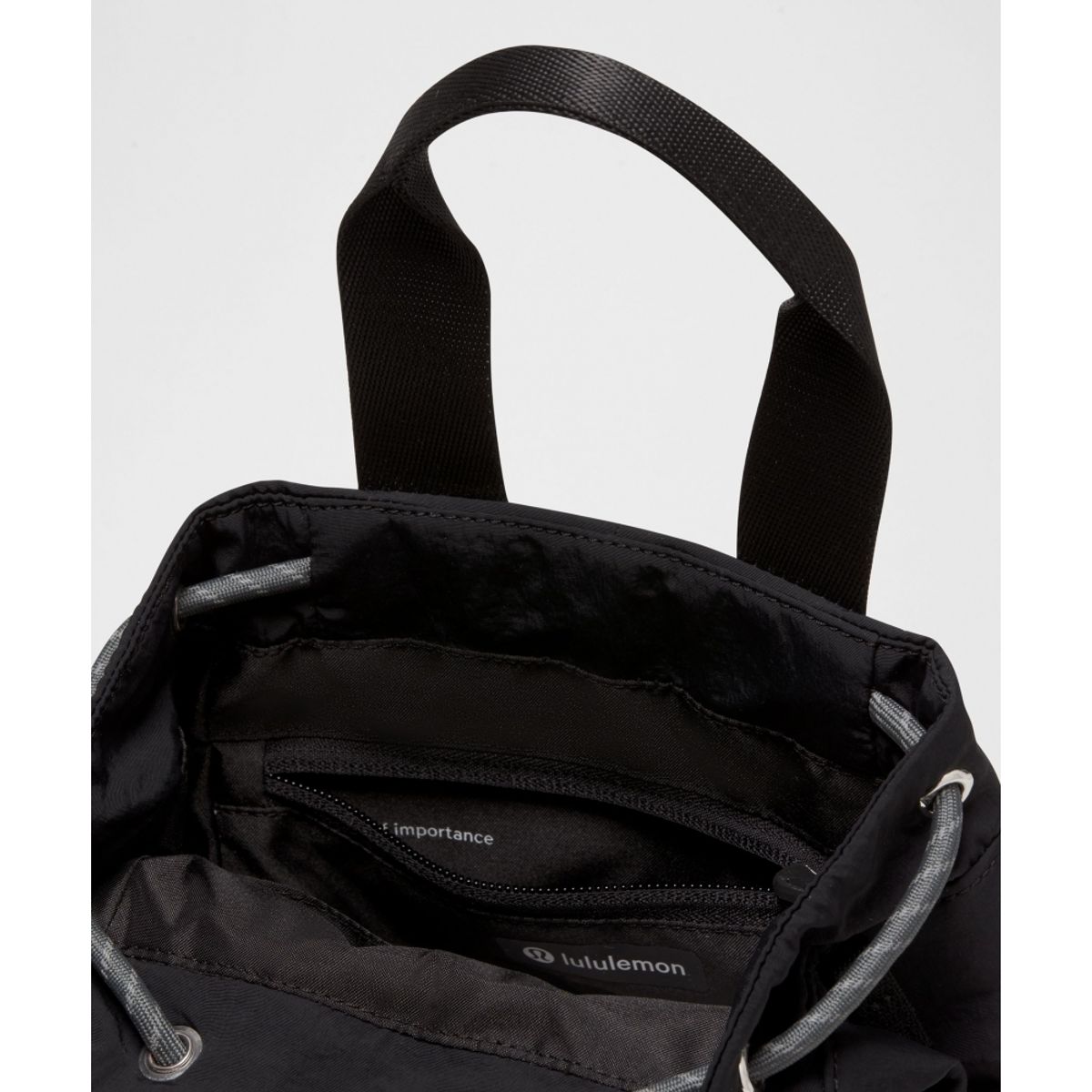 룰루레몬(LULULEMON) 컨버터블 드로스트링 버킷백 미니 5L  BLK ONGE SLVR