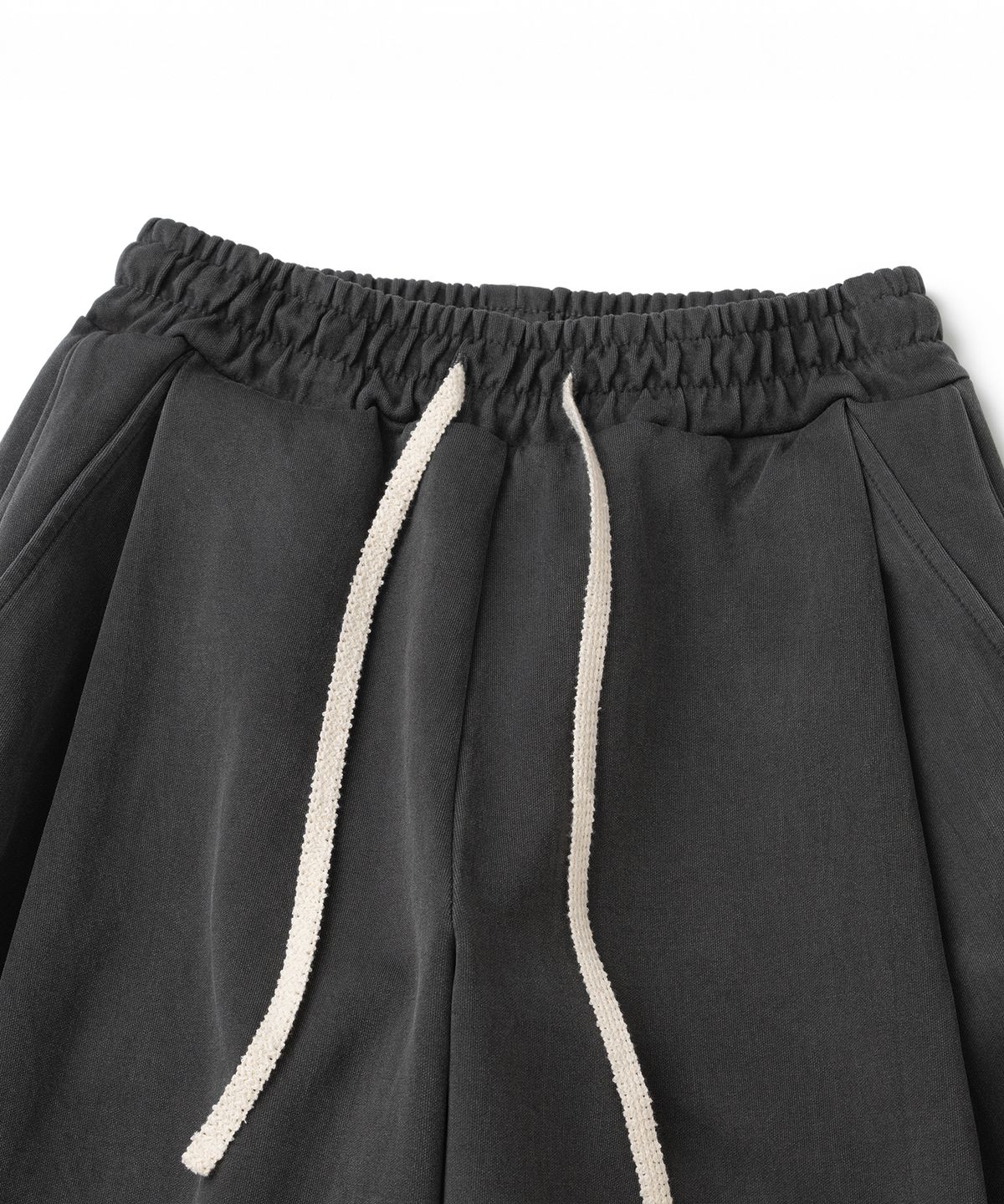 니티드(KNITTED) 피그먼트 커브드 트레이닝 팬츠 WASHING CHARCOAL
