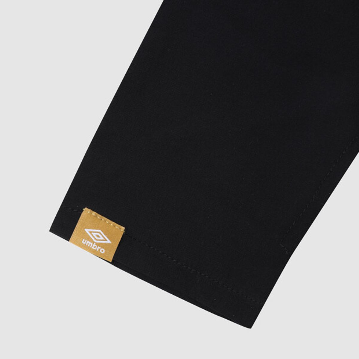 엄브로(UMBRO) 루즈핏 레이어드 암슬리브 블랙 UR223SAO54