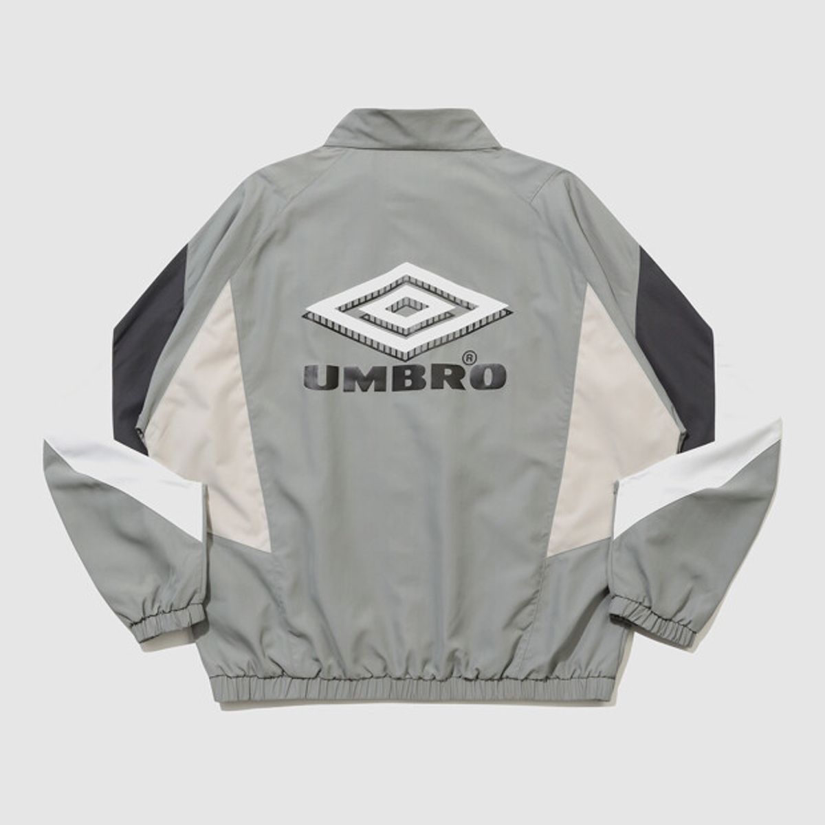 엄브로(UMBRO) HBL OG 컬러블럭 스탠넥 바람막이 자켓 그레이 UR221CJK56