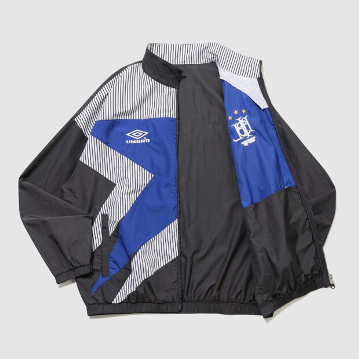 엄브로(UMBRO) HBL 스타챔프 별 스탠넥 바람막이 자켓 차콜 UR221CJK52
