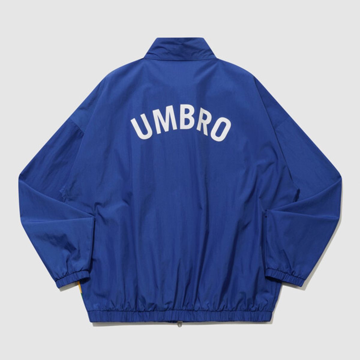 엄브로(UMBRO) HBL 스타챔프 별 스탠넥 바람막이 자켓 블루 UR221CJK52