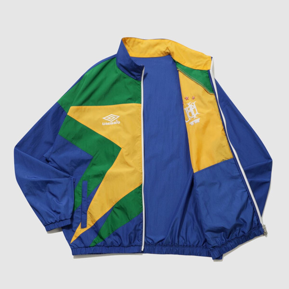 엄브로(UMBRO) HBL 스타챔프 별 스탠넥 바람막이 자켓 블루 UR221CJK52