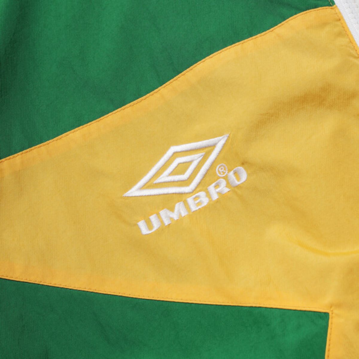 엄브로(UMBRO) HBL 스타챔프 별 스탠넥 바람막이 자켓 블루 UR221CJK52