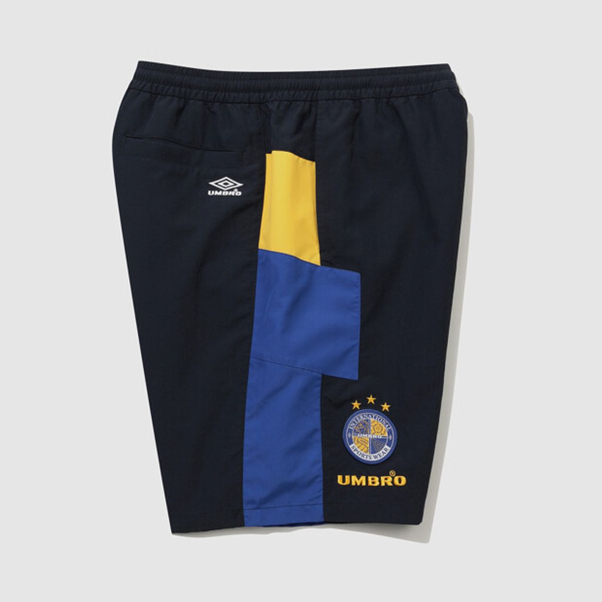 엄브로(UMBRO) HBL OG 컬러블럭 5부 반바지 네이비 UR221CHP56