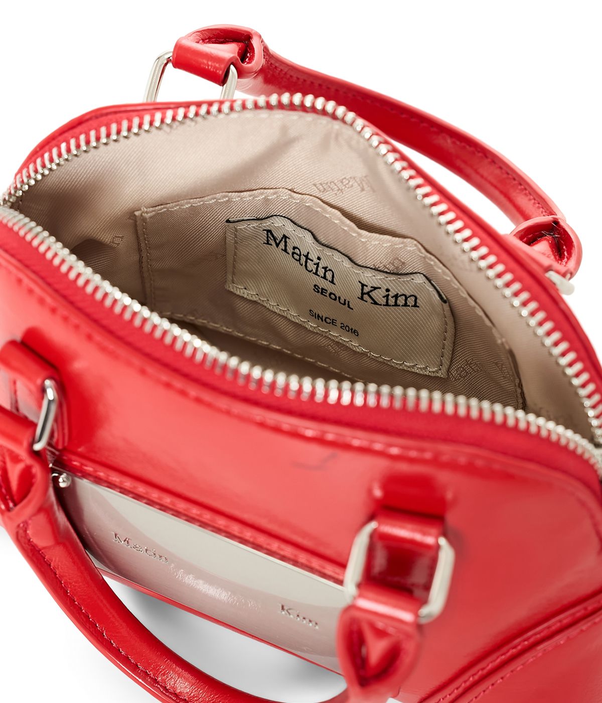 마뗑킴(MATIN KIM) CURVE ZIP MINI BAG IN RED