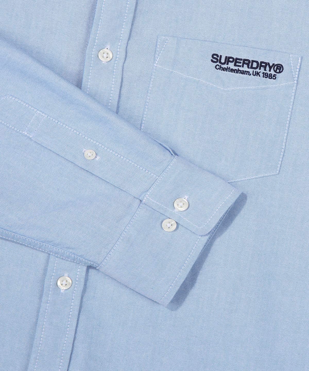 슈퍼드라이(SUPERDRY) 코어 옥스퍼드 셔츠 라이트블루 SDUIRAP01LBL
