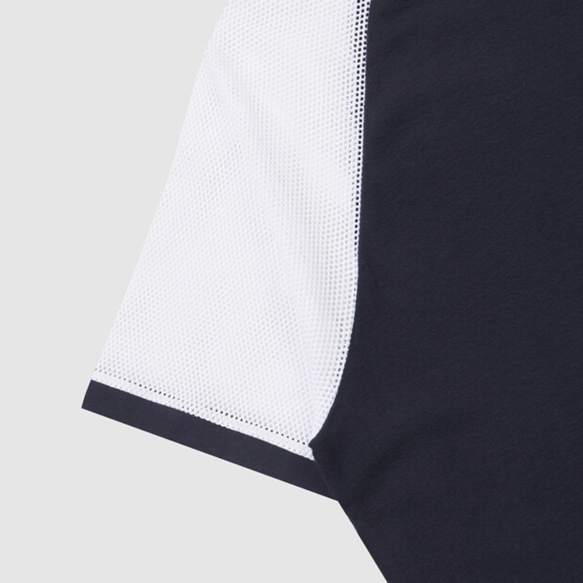엄브로(UMBRO) 크리스피 타슬란 메쉬 하이브리드 반팔 티셔츠 네이비 UR211CRS50