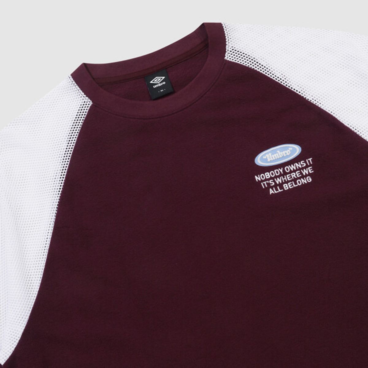 엄브로(UMBRO) 크리스피 타슬란 메쉬 하이브리드 반팔 티셔츠 와인 UR211CRS50