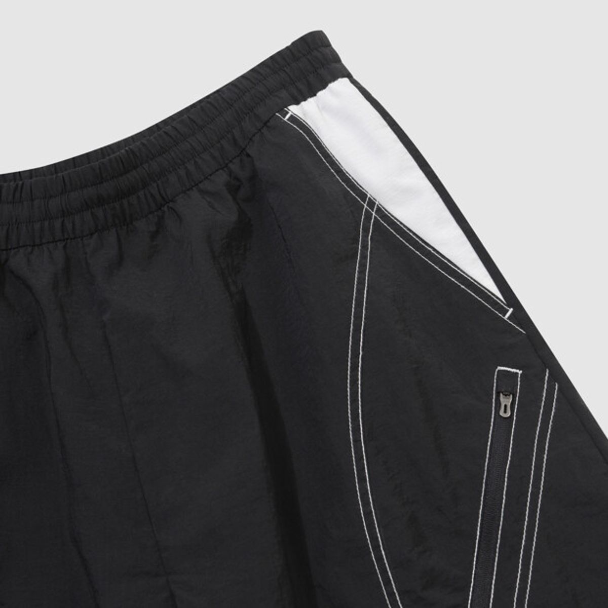 엄브로(UMBRO) 크리스피 타슬란 5.5부 버뮤다 팬츠 블랙 UR221CHP58