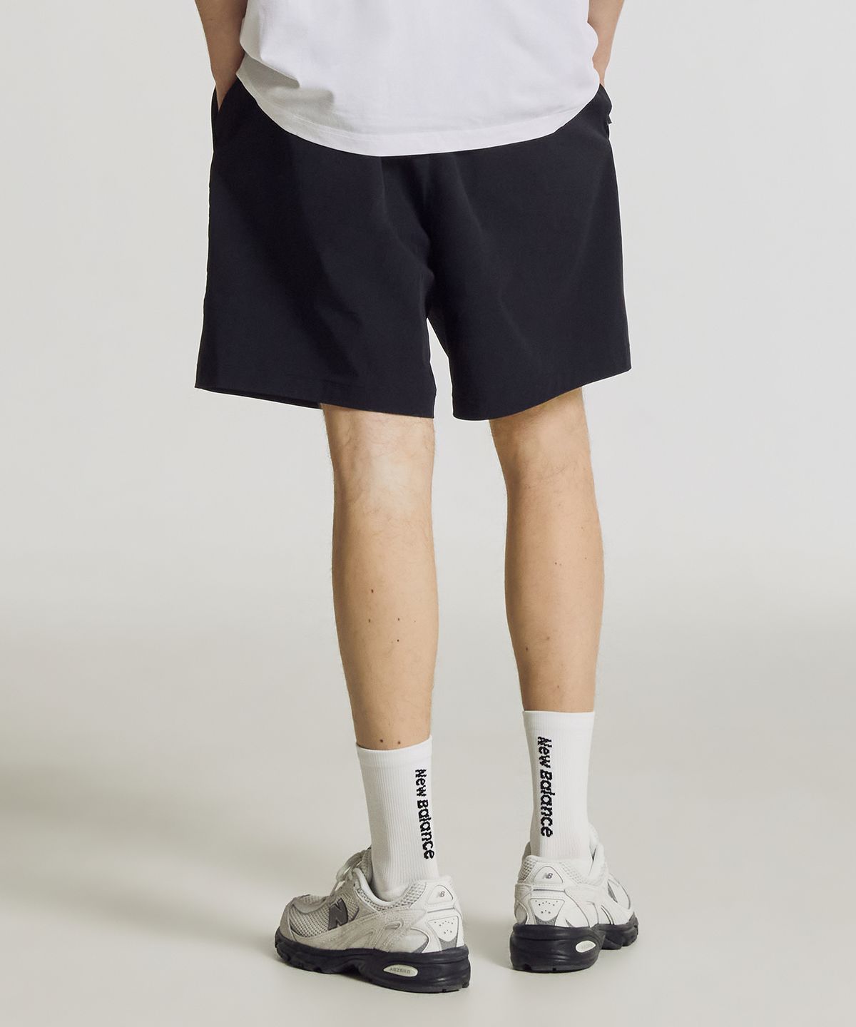 뉴발란스(NEW BALANCE) NBNVG31603 / UNI FROZEN ESSENTIAL 4.5부 쇼츠 (BLACK)