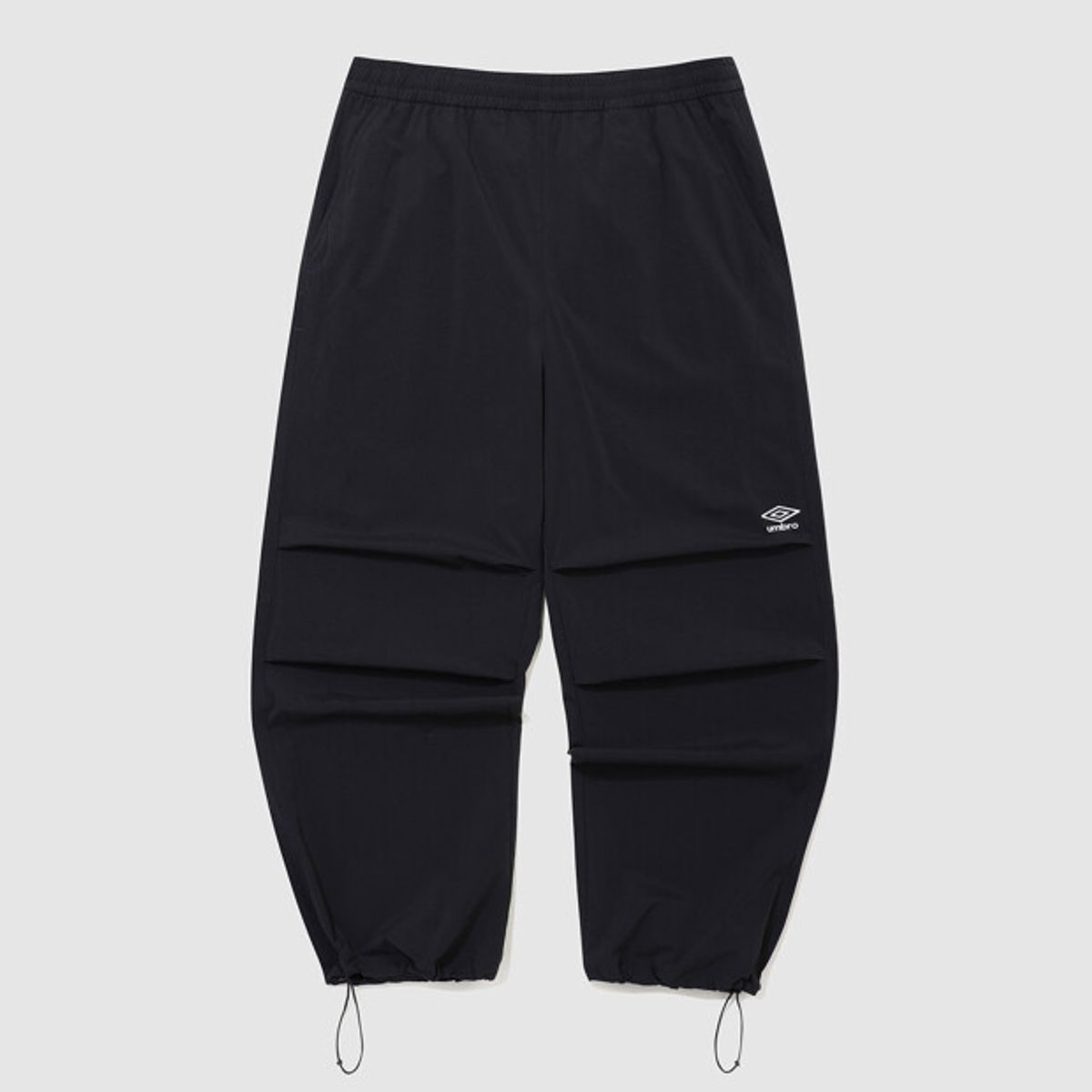 엄브로(UMBRO) 파라슈트 핀턱 2WAY 와이드 팬츠 블랙 UR223CPT51