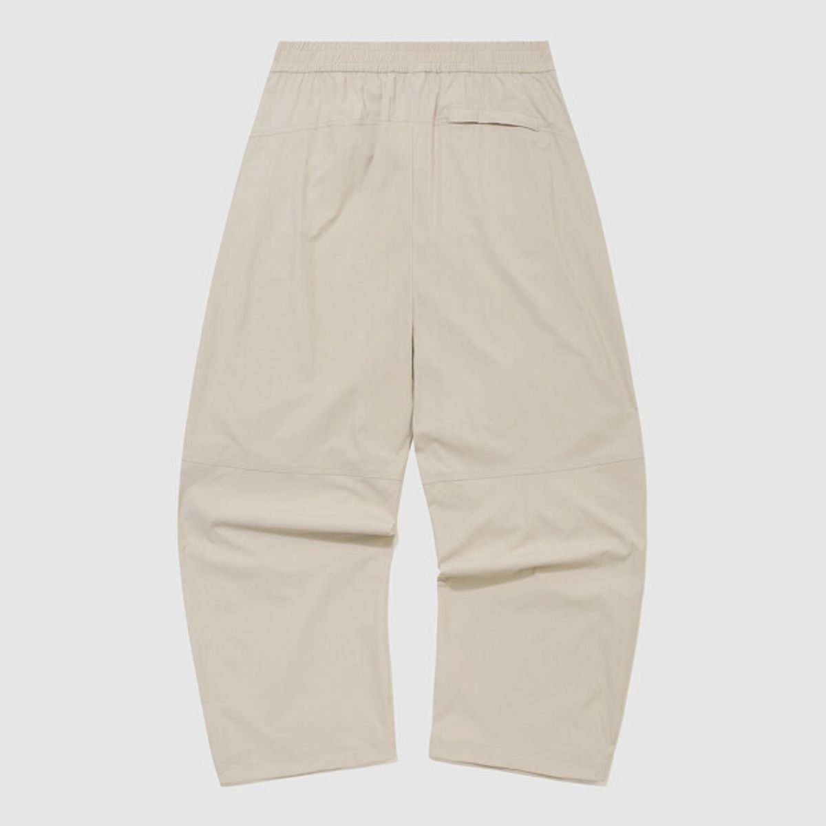 엄브로(UMBRO) 파라슈트 핀턱 2WAY 와이드 팬츠 베이지 UR223CPT51