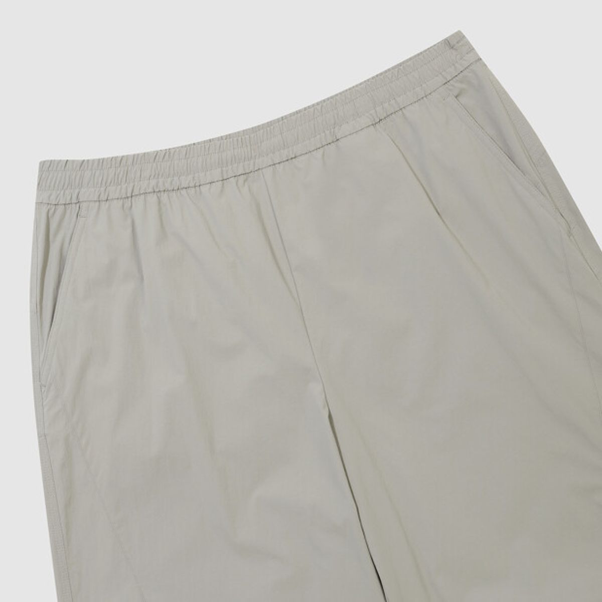엄브로(UMBRO) 파라슈트 핀턱 2WAY 와이드 팬츠 그레이 UR223CPT51