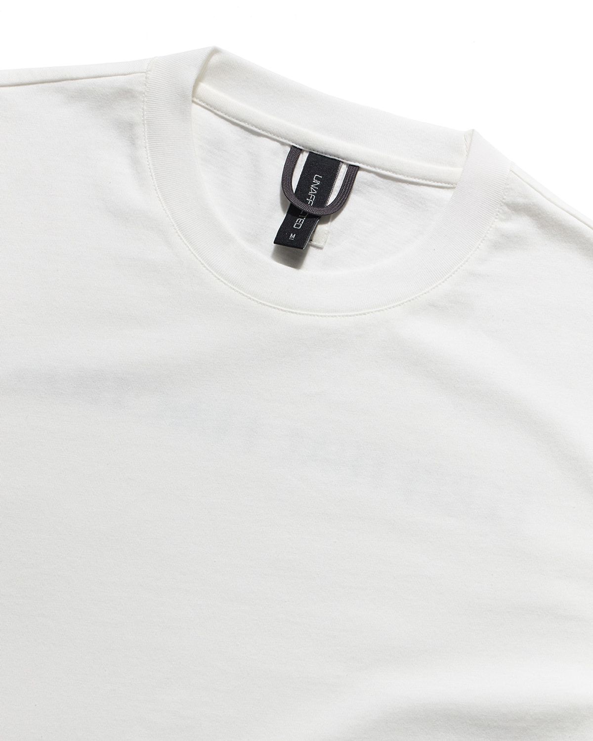언어펙티드 에센셜(UNAFFECTED ESSENTIAL) PERPETUAL FUNCTION  T-SHIRT / OFF WHITE