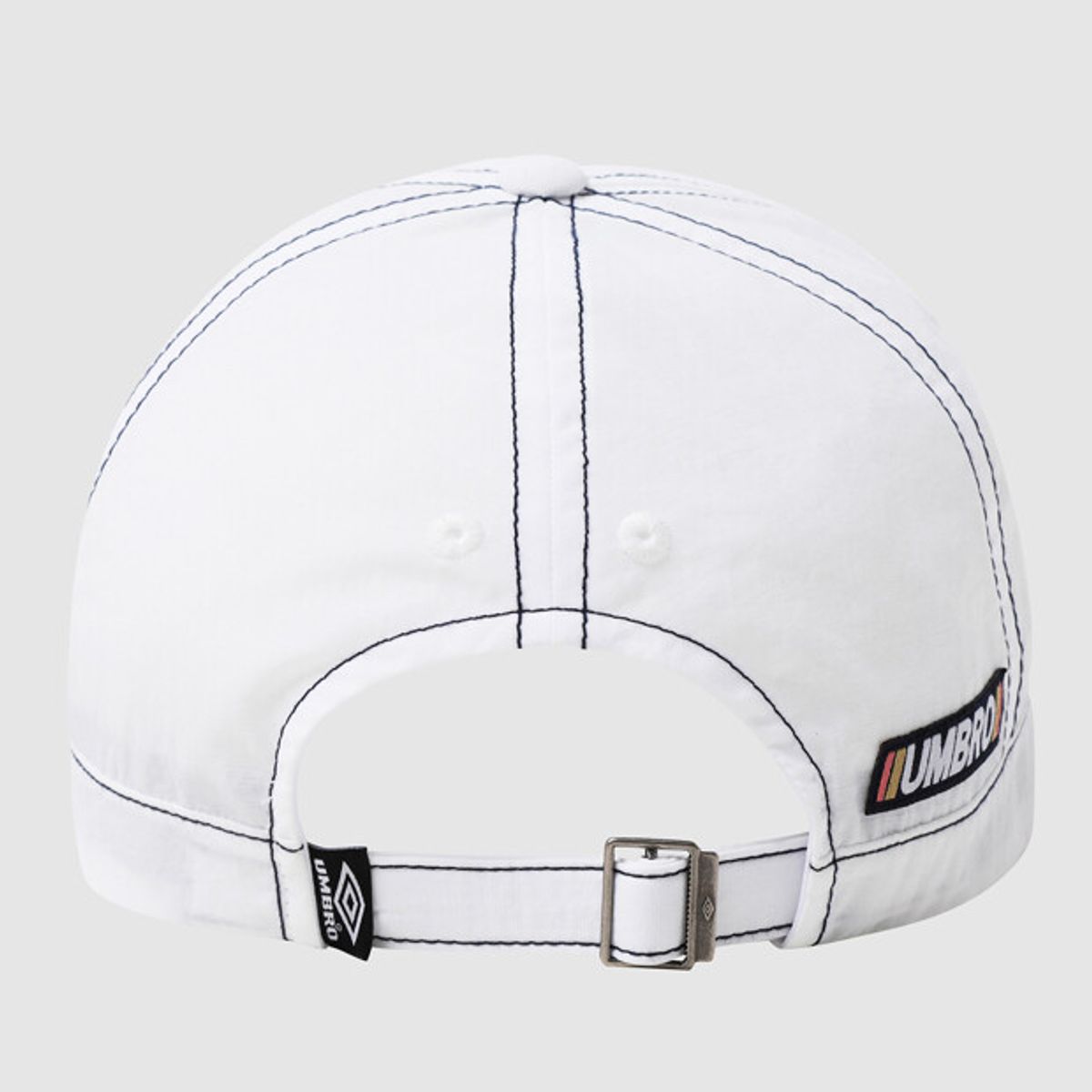 엄브로(UMBRO) 크리스피 타슬란 캡 화이트 UR221CCP51