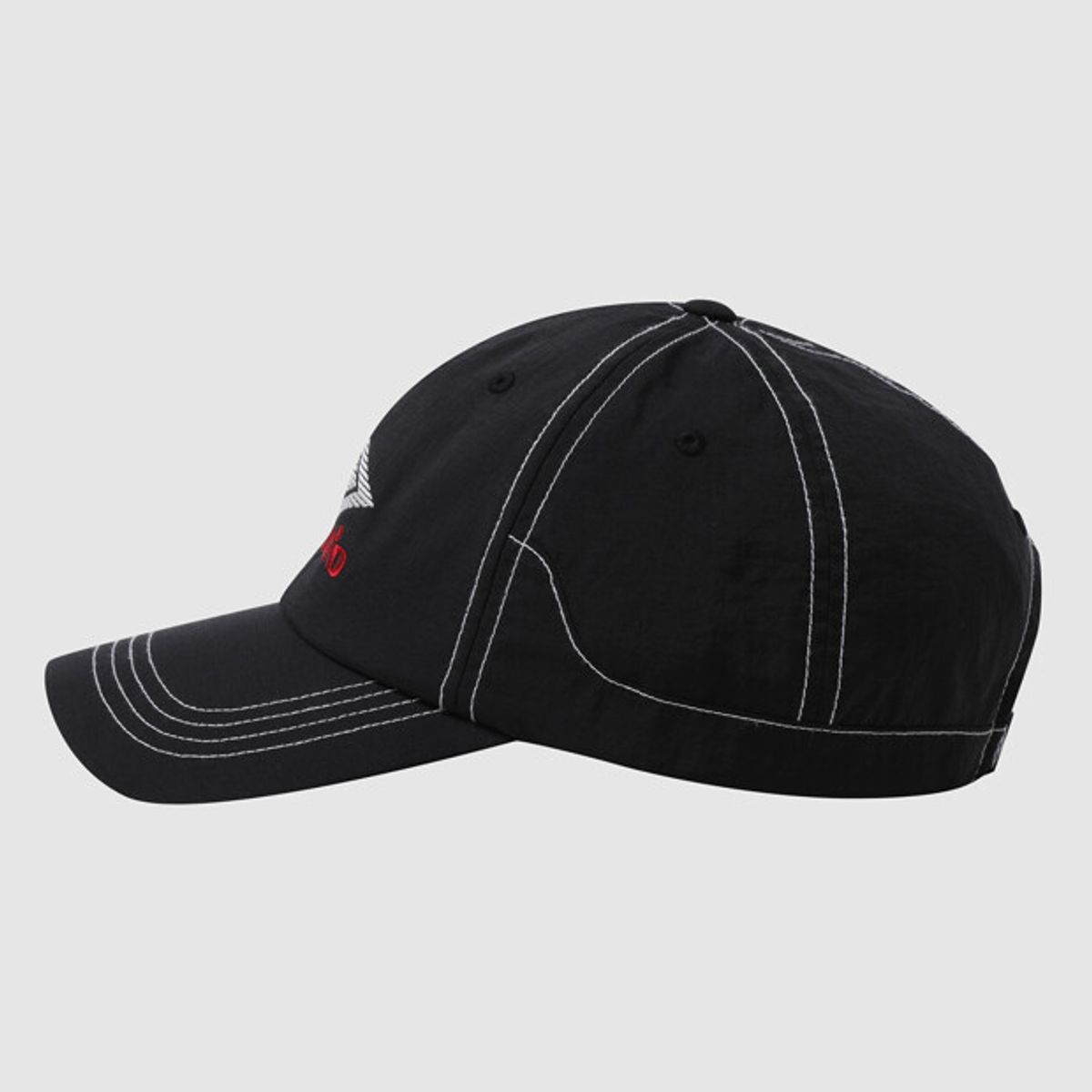 엄브로(UMBRO) 크리스피 타슬란 캡 블랙 UR221CCP51