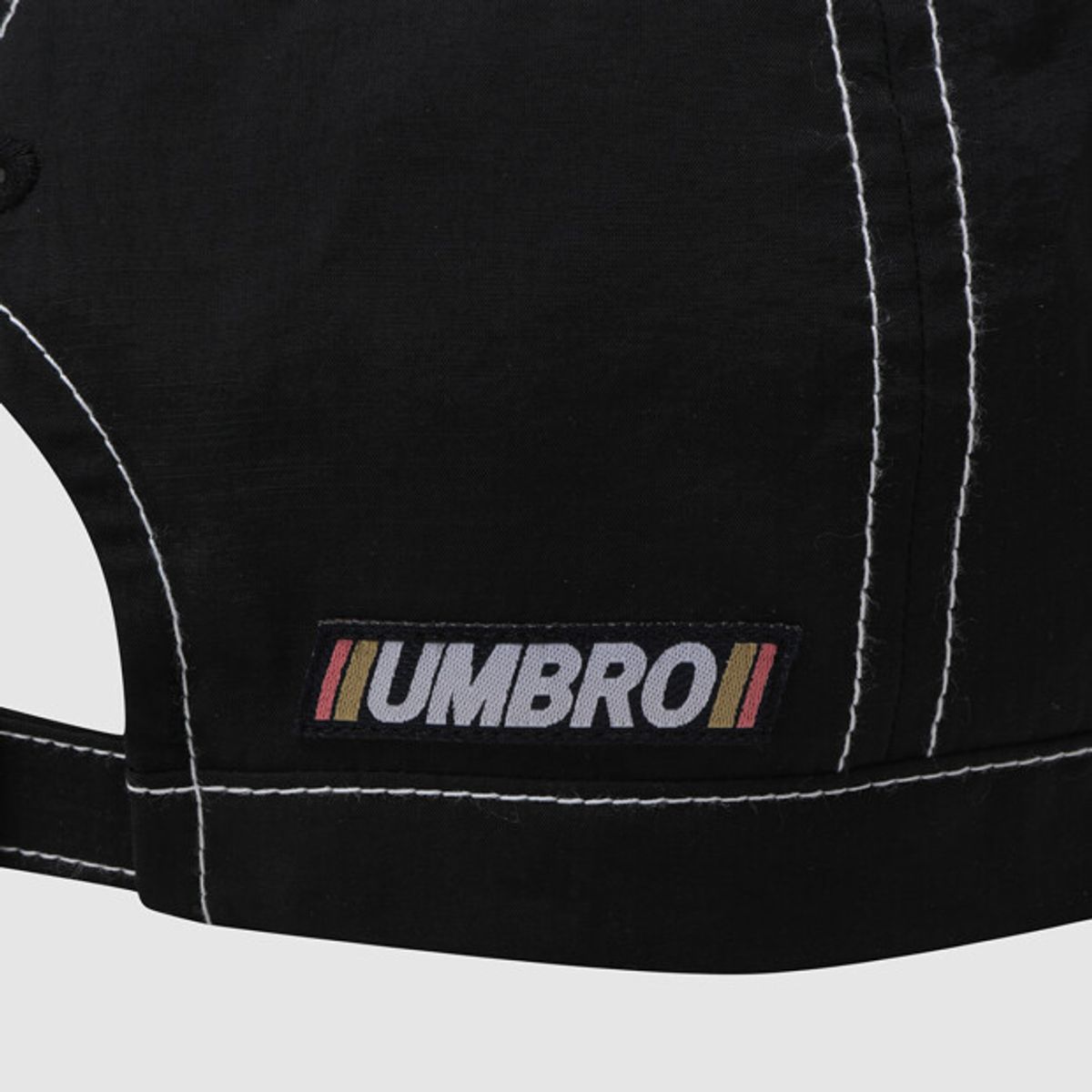 엄브로(UMBRO) 크리스피 타슬란 캡 블랙 UR221CCP51