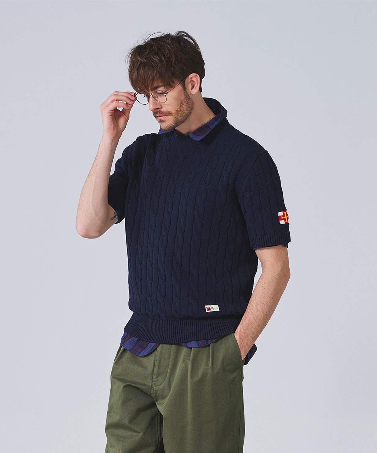 건지 울른스(Guernsey Woollens) 케이블 반팔 크루넥 니트 컬렉션