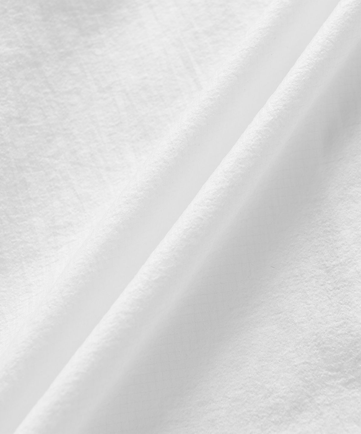 뉴발란스(NEW BALANCE) NBNAG2W512 / WOMEN 브리즈라이트 초경량 패커블 우븐자켓 (WHITE)