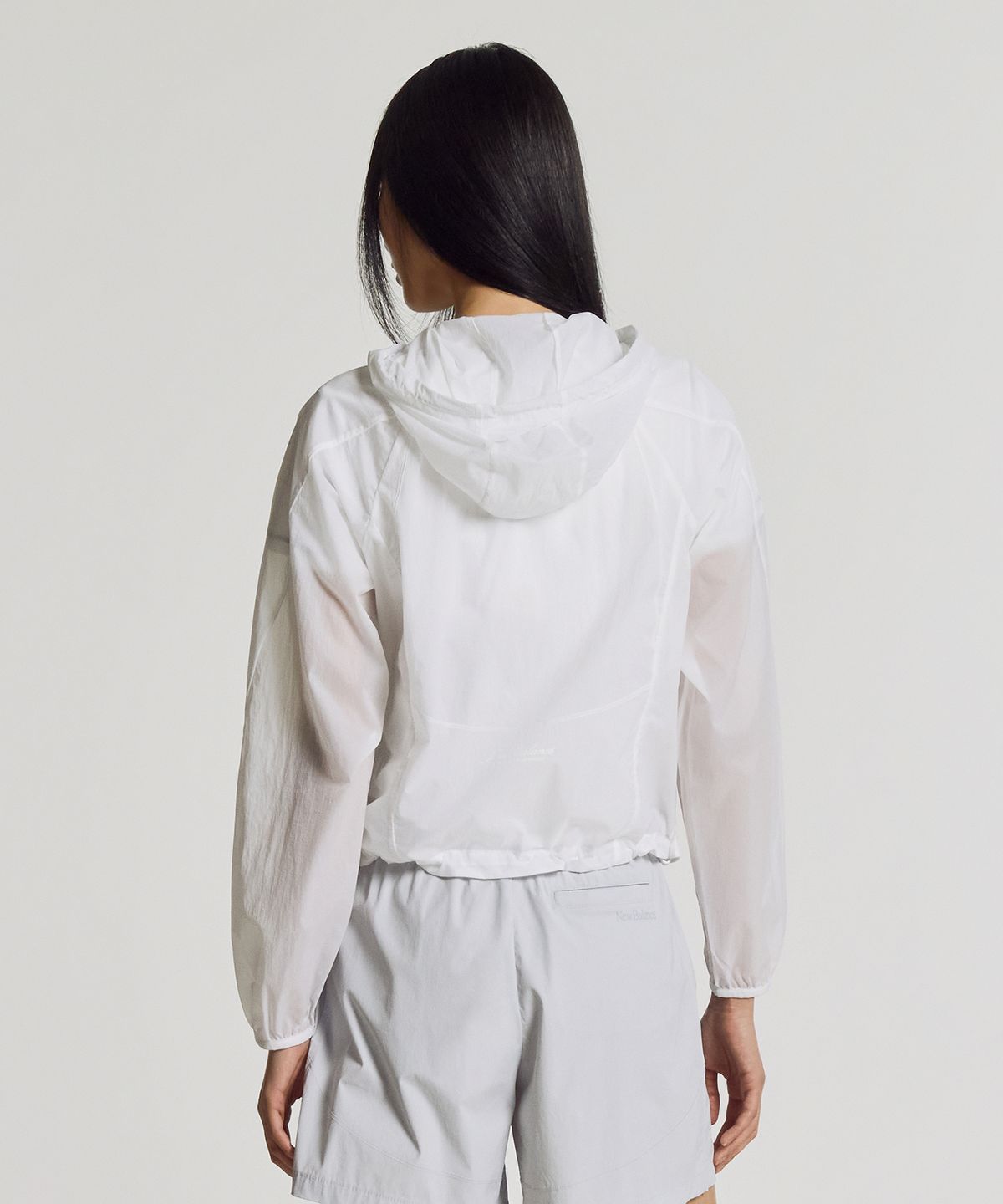 뉴발란스(NEW BALANCE) NBNAG2W512 / WOMEN 브리즈라이트 초경량 패커블 우븐자켓 (WHITE)