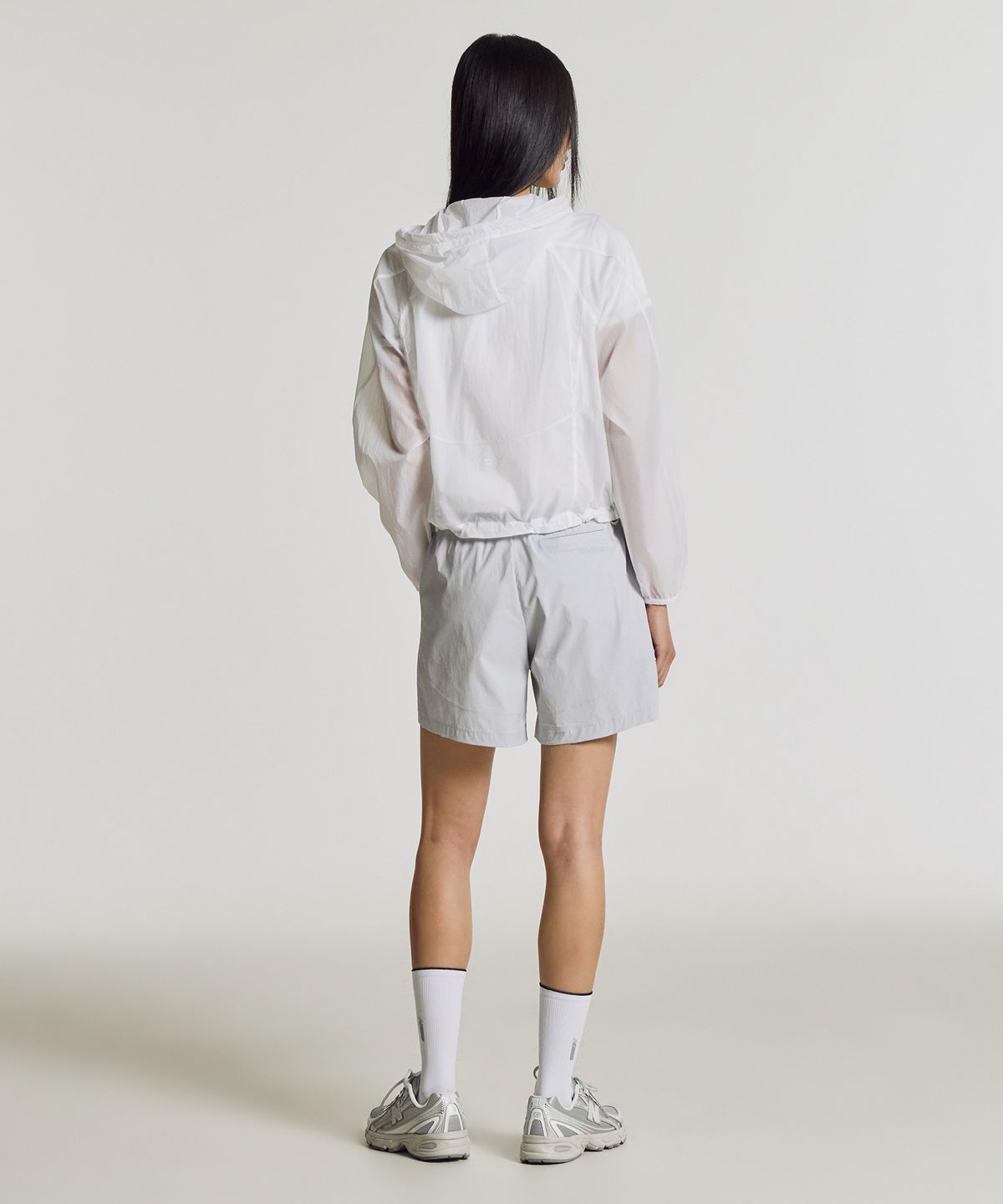 뉴발란스(NEW BALANCE) NBNAG2W512 / WOMEN 브리즈라이트 초경량 패커블 우븐자켓 (WHITE)