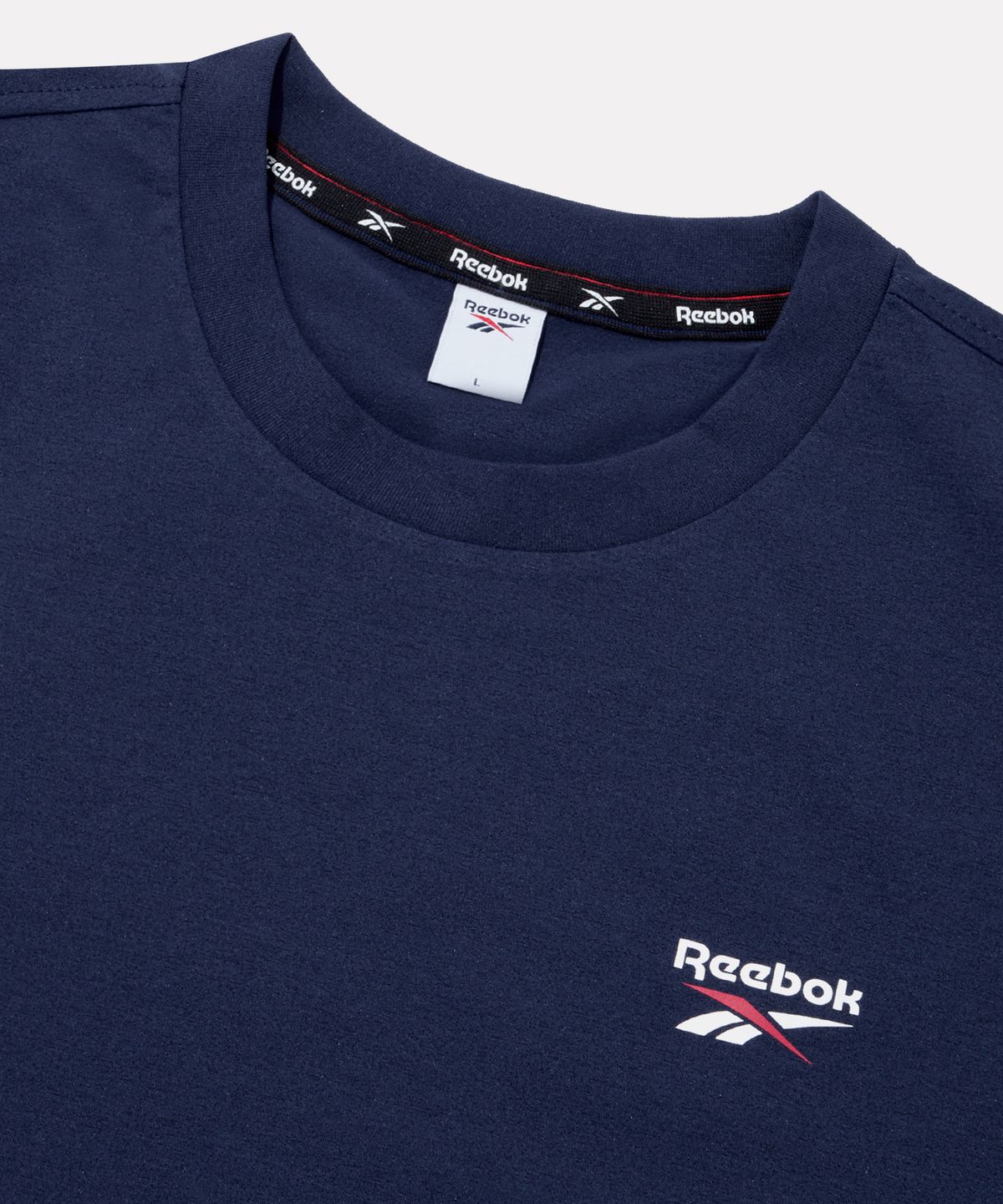 리복(REEBOK) 빅벡터 슬로건 프레쉬 반팔티 - 네이비