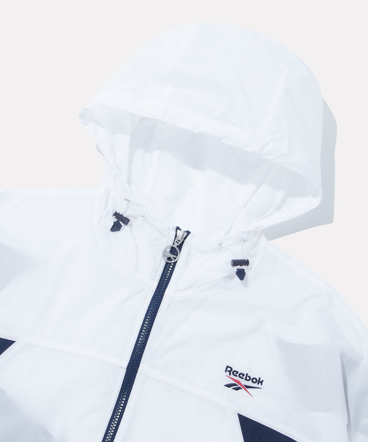 리복(REEBOK) 컬러블록 메쉬 매칭 윈드브레이커 - 화이트:네이비