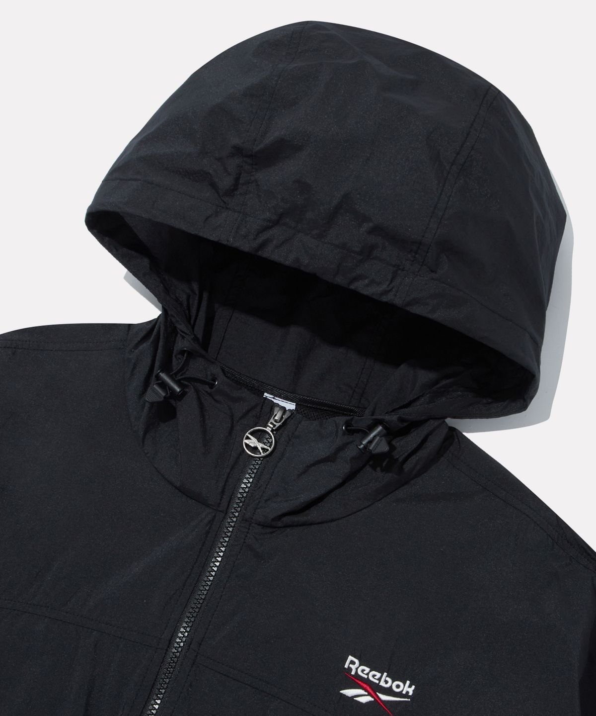 리복(REEBOK) 컬러블록 메쉬 매칭 윈드브레이커 - 블랙:레드