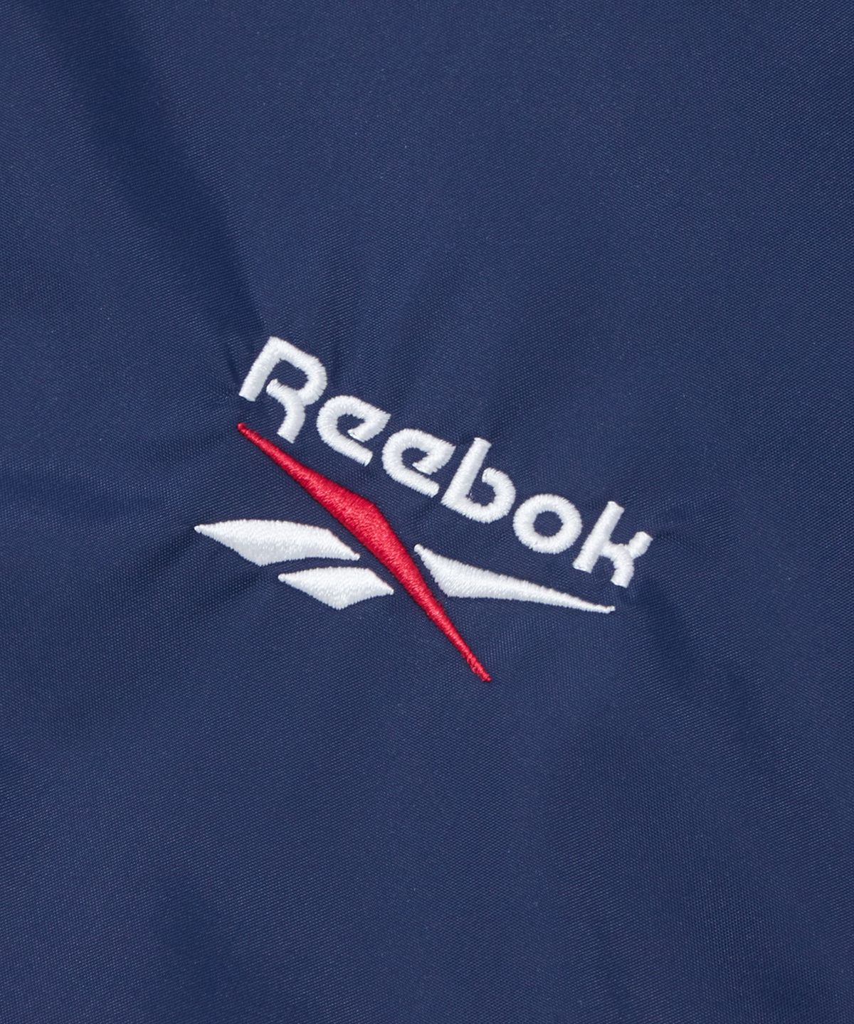 리복(REEBOK) DNA 경량 후드 윈드브레이커 - 네이비:블랙