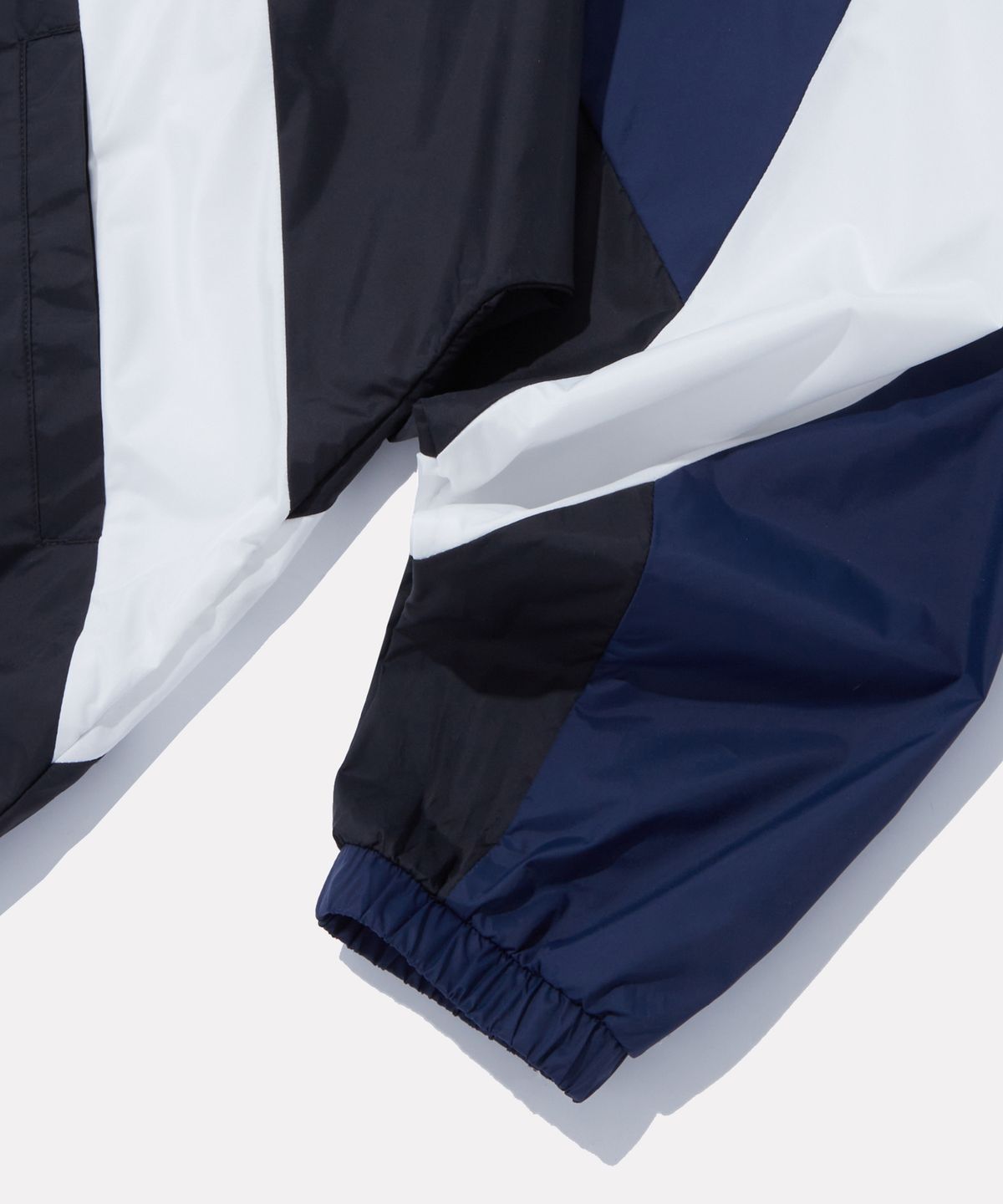 리복(REEBOK) DNA 경량 후드 윈드브레이커 - 네이비:블랙
